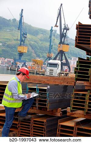 Stock Image - Steel Girders, Siderurgical products, Pasajes Port, Gipuzkoa, Basque Country, Spain.. Fotosearch