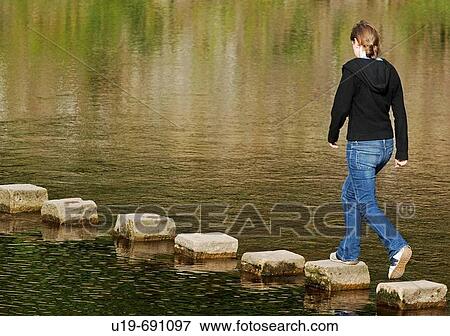 Stock Photo - Stepping stones over the River Wharfe, Bolton Abbey, Wharfedale, Yorkshire, England, UK. Fotosearch