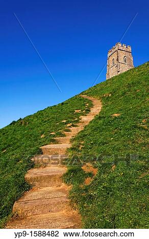 Stock Image - Steps leading up Glastonbury Tor, Glastonbury, Somerset, England. Fotosearch
