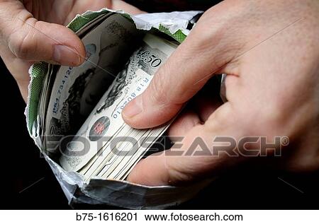 sterling pounds in the hands View Large Photo Image Stock Image - sterling pounds in the hands. Fotosearch