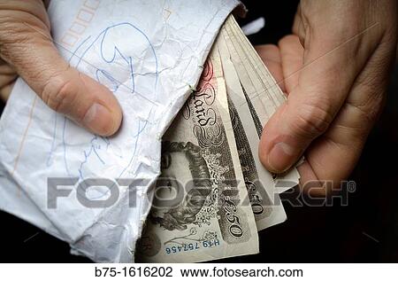 sterling pounds in the hands View Large Photo Image Stock Image - sterling pounds in the hands. Fotosearch
