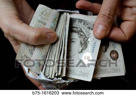 sterling pounds in the hands View Large Photo Image Stock Image - sterling pounds in the hands. Fotosearch