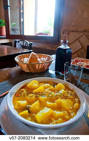 Stew of potatoes in a rustic restaurant. Lozoya, Madrid province, Spain. View Large Photo Image Picture - Stew of potatoes in a rustic restaurant. Lozoya, Madrid province, Spain.. Fotosearch