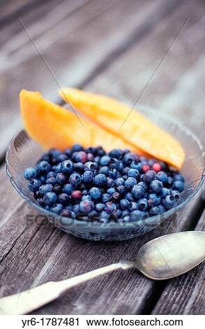 Still life blueberries and melon View Large Photo Image Stock Image - Still life blueberries and melon. Fotosearch