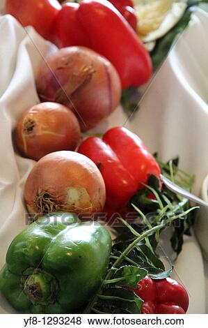 Still life with assorted peppers and onions View Large Photo Image Stock Photo - Still life with assorted peppers and onions. Fotosearch