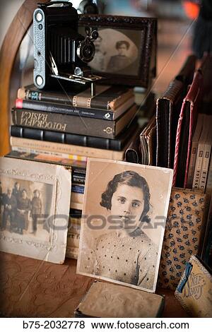Still life, with camera, books and old photographs View Large Photo Image Stock Photo - Still life, with camera, books and old photographs. Fotosearch