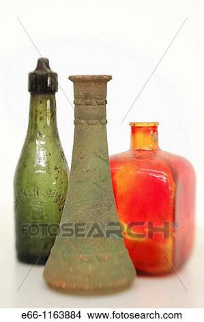 still life with glass and ceramic bottles taken wiith lens baby for selective focus View Large Photo Image Picture - still life with glass and ceramic bottles taken wiith lens baby for selective focus. Fotosearch