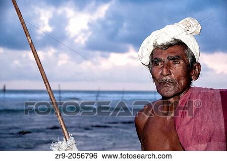 Stilt fishermen, Ahangama, Sri Lanka, Indian Ocean, Asia. View Large Photo Image Stock Photograph - Stilt fishermen, Ahangama, Sri Lanka, Indian Ocean, Asia.. Fotosearch