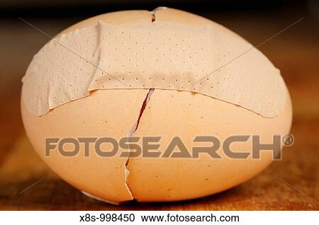 Stock photo of a broken eggshell taped back together with a sticking plaster View Large Photo Image Stock Image - Stock photo of a broken eggshell taped back together with a sticking plaster. Fotosearch