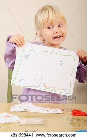 Stock photo of a four year old girl showing a picture of her house she has just made View Large Photo Image Stock Image - Stock photo of a four year old girl showing a picture of her house she has just made. Fotosearch