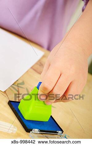 Stock photo of a four year old girl using ink stamps during a creative play session View Large Photo Image Stock Image - Stock photo of a four year old girl using ink stamps during a creative play session. Fotosearch