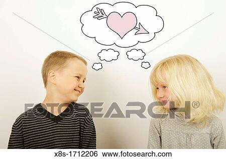 Stock photo of two children looking at each other View Large Photo Image Stock Photograph - Stock photo of two children looking at each other. Fotosearch