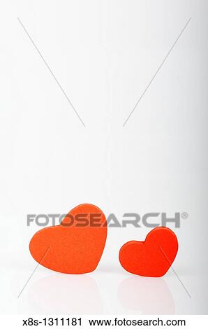 Stock photo red love hearts displayed on a white background View Large Photo Image Stock Image - Stock photo red love hearts displayed on a white background. Fotosearch