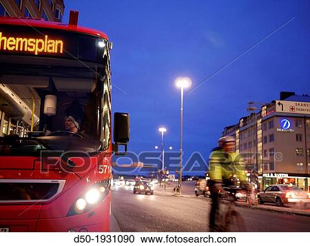 Stock Image - STOCKHOLM SWEDEN Hornstull section of town Bus and cyclist Public transport.. Fotosearch