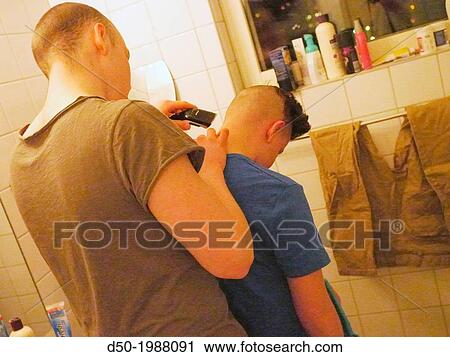 STOCKHOLM SWEDEN Older brother 16 clipping younger brother's (12) hair. View Large Photo Image Stock Image - STOCKHOLM SWEDEN Older brother 16 clipping younger brother's (12) hair.. Fotosearch