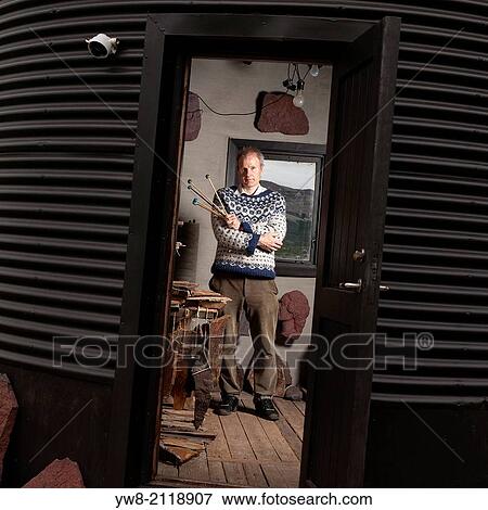 Stock Photo - Stone artist in his studio, Borgarfjordur, Iceland.. Fotosearch