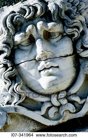Stone carving of a Medusa head. Didyma. Turkey View Large Photo Image Picture - Stone carving of a Medusa head. Didyma. Turkey. Fotosearch