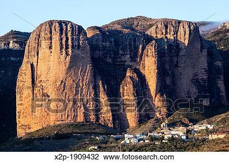 Stone cliffs of Mallos de Riglos, Huesca, Aragon, Spain View Large Photo Image Stock Image - Stone cliffs of Mallos de Riglos, Huesca, Aragon, Spain. Fotosearch