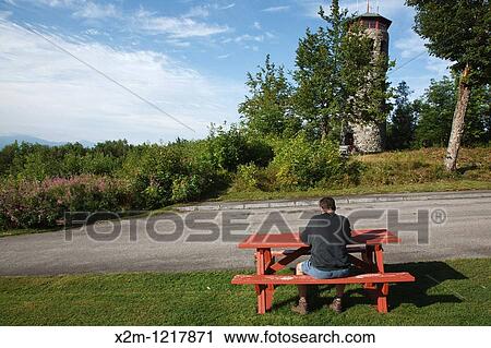 Stock Image - Stone Fire Tower at John Wingate Weeks Estate on the summit of Mt Prospect in Lancaster, New Hampshire USA The Mount Prospect Tower was built by John W Weeks in 1912 and is still in operation today. Fotosearch