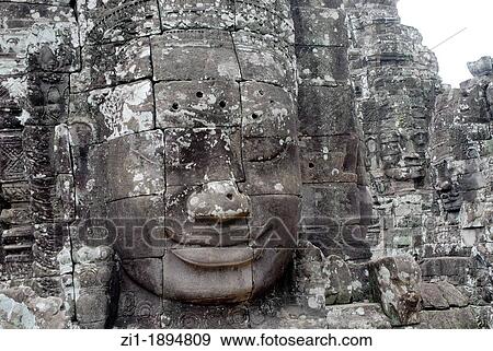 stone heads at Angkor Ta Prohm View Large Photo Image Stock Photo - stone heads at Angkor Ta Prohm. Fotosearch