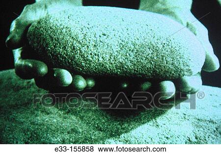 Stone in hands View Large Photo Image Stock Photo - Stone in hands. Fotosearch