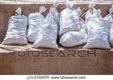 Stones in bags to be used as weights. View Large Photo Image Stock Photo - Stones in bags to be used as weights.. Fotosearch