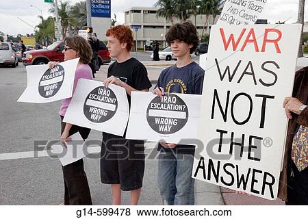 Stop Iraq Escalation, protest anti-war. Alton Road. Miami Beach. Florida. USA. View Large Photo Image Stock Photo - Stop Iraq Escalation, protest anti-war. Alton Road. Miami Beach. Florida. USA.. Fotosearch