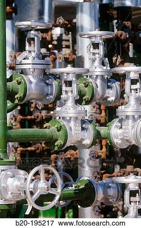 Stopcocks. Hydrocracker. Repsol-YPF oil refinery. Tarragona province. Spain View Large Photo Image Stock Photo - Stopcocks. Hydrocracker. Repsol-YPF oil refinery. Tarragona province. Spain. Fotosearch