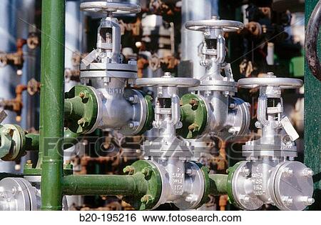 Stopcocks. Hydrocracker. Repsol-YPF oil refinery. Tarragona province. Spain View Large Photo Image Stock Photograph - Stopcocks. Hydrocracker. Repsol-YPF oil refinery. Tarragona province. Spain. Fotosearch