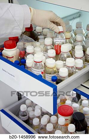 Stock Photograph - Storage of reagents, synthesis lab, research laboratory, IkerChem research lab, design and synthesis of new chemical entities with therapeutic applications in oncology, discovery and development of novel drugs for the treatment of cancer. Fotosearch