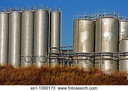 Stock Image - Storage tanks, industry, Gava, Barcelona province, Spain. Fotosearch