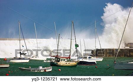 Stock Image - Storm at the Bay of Biscay, Port of Castro Urdiales, Cantabria, Northern Spain. Fotosearch
