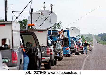 Stock Image - Storm chasers with Project Vortex 2 line up along a road in South Dakota, USA, June 3, 2010. Fotosearch