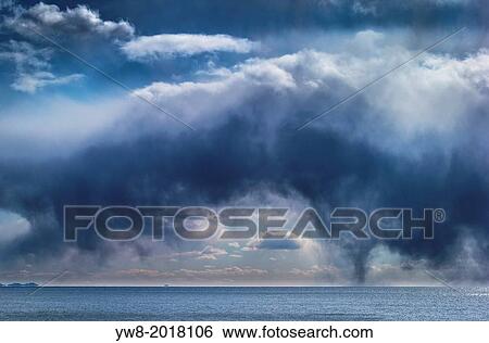 Storm Clouds over calm seas, Reykjavik, Iceland. View Large Photo Image Stock Photograph - Storm Clouds over calm seas, Reykjavik, Iceland.. Fotosearch