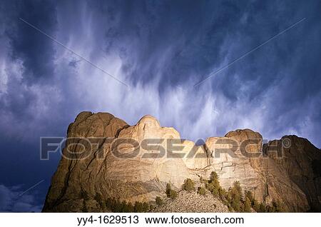 Storm clouds over Mount Rushmore National Memorial, at night, South Dakota, USA View Large Photo Image Stock Image - Storm clouds over Mount Rushmore National Memorial, at night, South Dakota, USA. Fotosearch