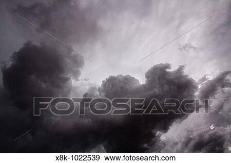Storm clouds overhead View Large Photo Image Stock Photo - Storm clouds overhead. Fotosearch