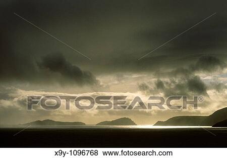 Storm over Blasket Islands from Slea Head, Dingle Peninsula, Co Kerry, Ireland L-R Inishvickillane, Inishabro, Great Blasket View Large Photo Image Stock Photo - Storm over Blasket Islands from Slea Head, Dingle Peninsula, Co Kerry, Ireland L-R Inishvickillane, Inishabro, Great Blasket. Fotosearch