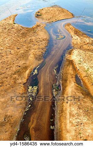 Stock Photography - Strange forms in the river, Olifants River, Kruger National Park, South Africa. Fotosearch