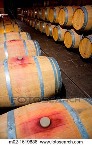 Stock Photograph - Stratvs Wine celler in La Geria in Lanzarote Island Belongs to the Canary Islands and its formation is due to recent volcanic activities Spain In La Geria the wines are produced in full volcanic ash A production is unique in the world. Fotosearch