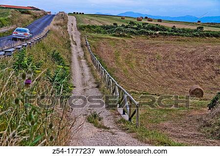 Straw Bales, landscape field, near Cabo Peas, Asturias, Spain View Large Photo Image Stock Photo - Straw Bales, landscape field, near Cabo Peas, Asturias, Spain. Fotosearch