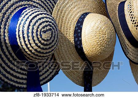 Straw hat for sale at a street market, on Santa Comba D? o, Portugal View Large Photo Image Picture - Straw hat for sale at a street market, on Santa Comba D? o, Portugal. Fotosearch