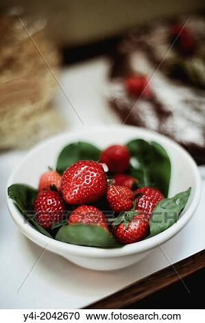 Stock Image - Strawberries. La Tupina. The greedy street. Bordeaux. Gironde. Aquitaine. France. Europe.. Fotosearch