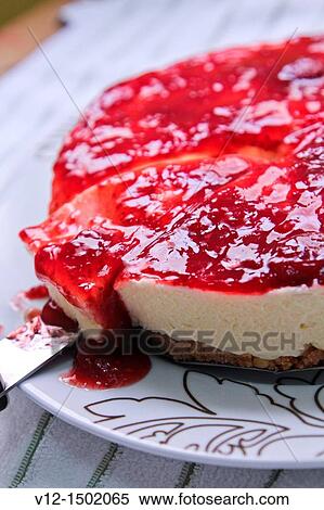 Stock Photography - strawberry cheesecake with strawberry sauce. Fotosearch