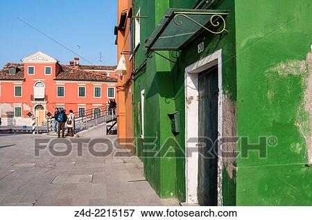 Stock Photo - Street and colorful houses on island Burano. Venice, Veneto region, Italy, Europe.. Fotosearch