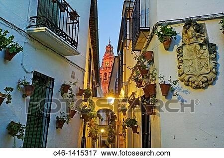 Street and Minaret tower of the Great Mosque, C? rdoba Andalusia, Spain View Large Photo Image Stock Photo - Street and Minaret tower of the Great Mosque, C? rdoba Andalusia, Spain. Fotosearch