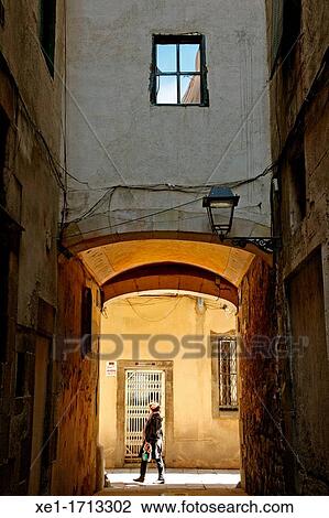 Stock Image - street, arcade, district of La Ribera, Barcelona, Catalonia, Spain. Fotosearch