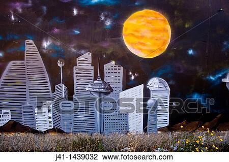 Stock Image - Street art, graffiti, cityscape and full moon, near railway tracks, Christchurch, New Zealand. Fotosearch