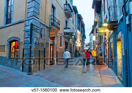 Stock Image - Street at night. Llanes, Asturias province, Spain.. Fotosearch