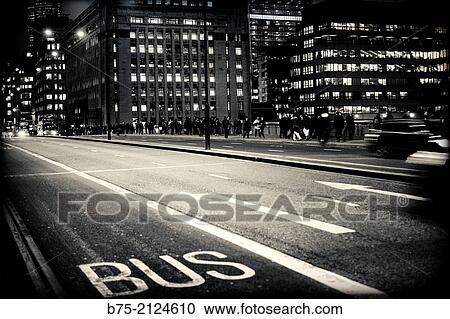 street at night with the written bus lane on asphalt, London Bridge, London, England, UK, Europe. View Large Photo Image Stock Image - street at night with the written bus lane on asphalt, London Bridge, London, England, UK, Europe.. Fotosearch
