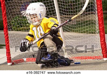 street hockey boy View Large Photo Image Stock Photo - street hockey boy. Fotosearch